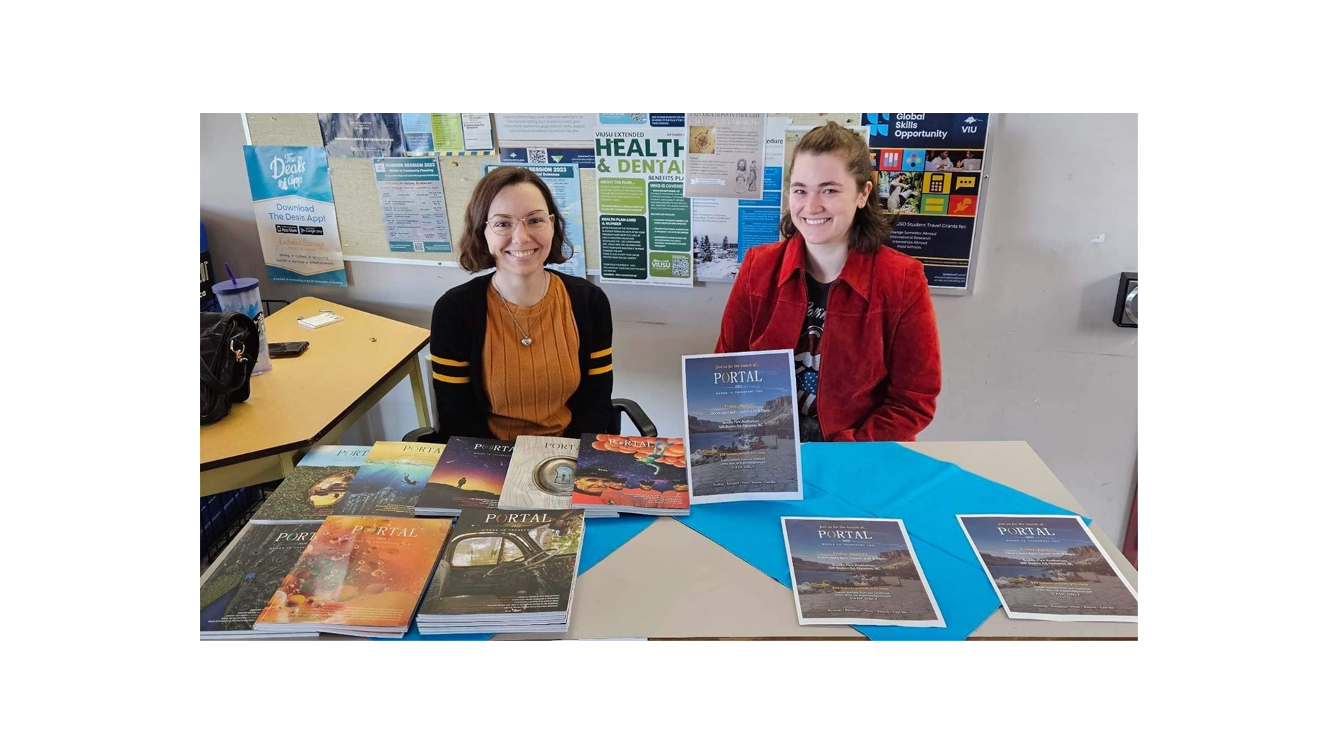 Portal 2023 Masthead selling launch tickets in the B345 Lobby / Left to right: Acquisitions Editor Kirsten Dayne, Fiction Editor Nicole Kaastra / Credit: Liz Baltzer